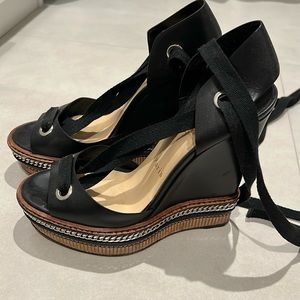 Excellent condition black leather Christian louboutin wedges sz 38